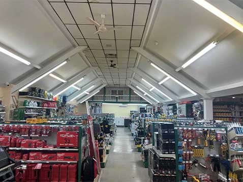 Store interior containing several rows of hardware and supplies